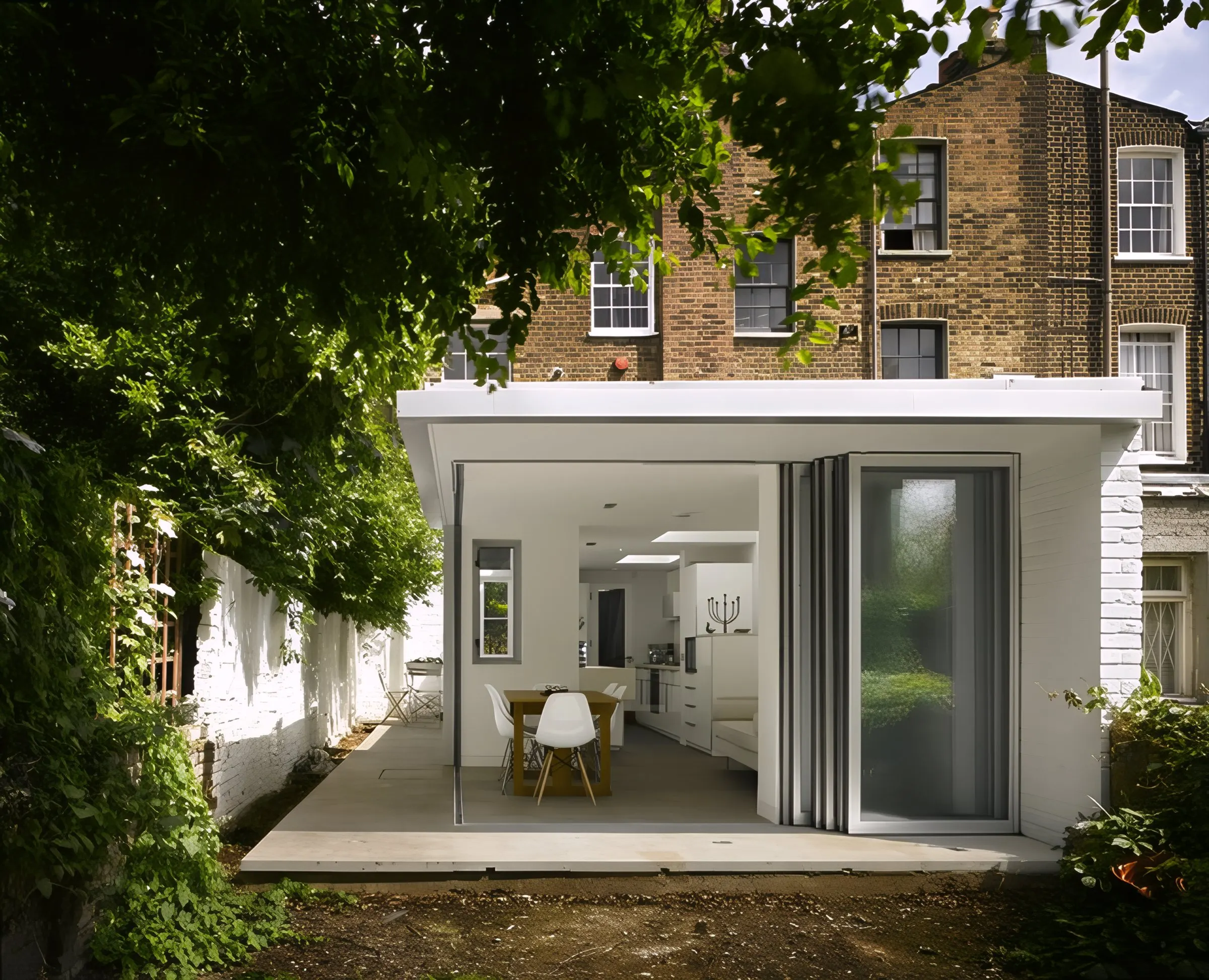 The glass corner slid open to the garden