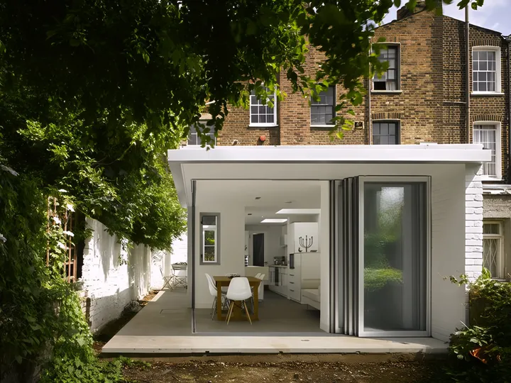 The glass corner slid open to the garden