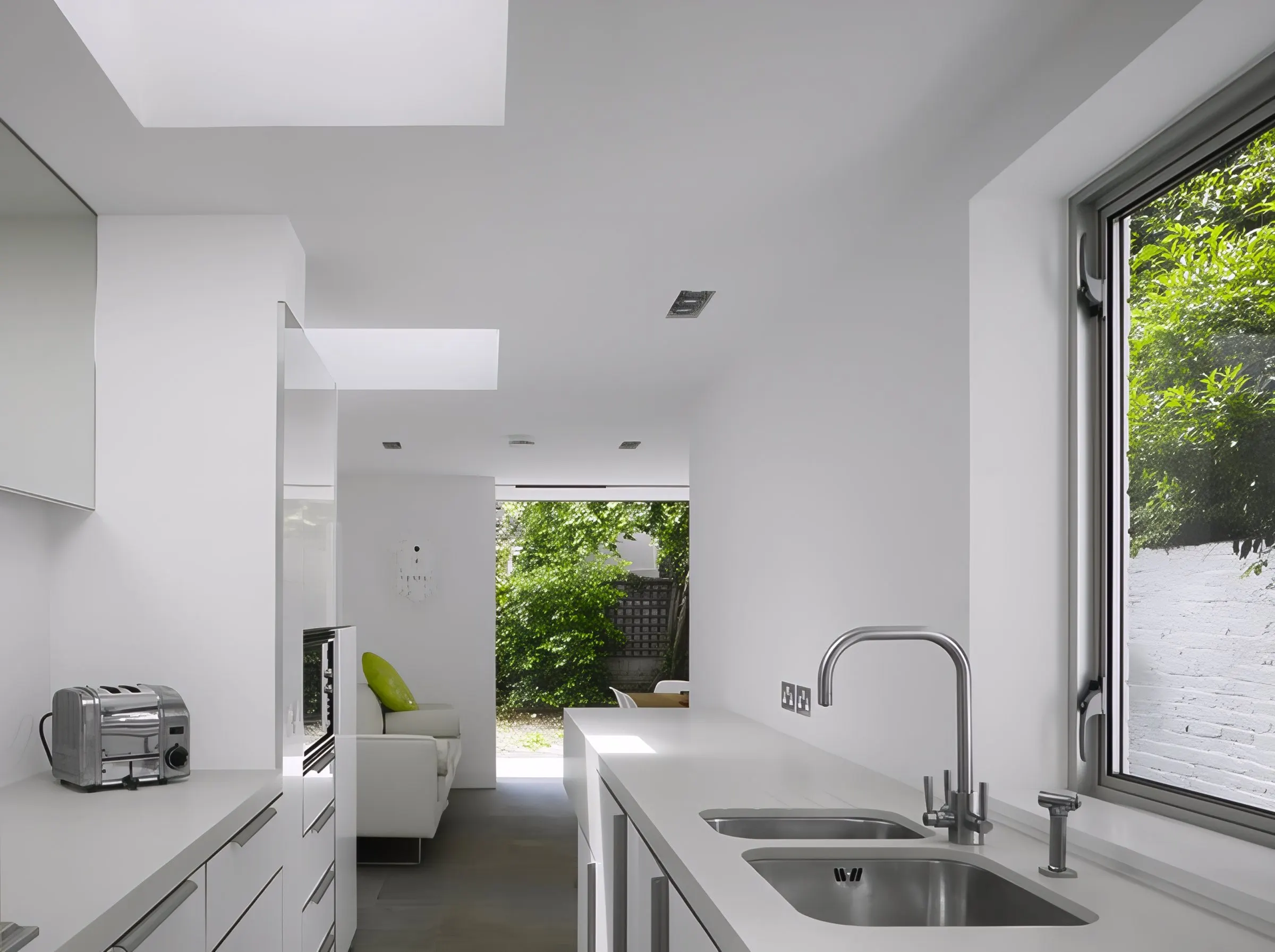 Galley kitchen leading to the garden