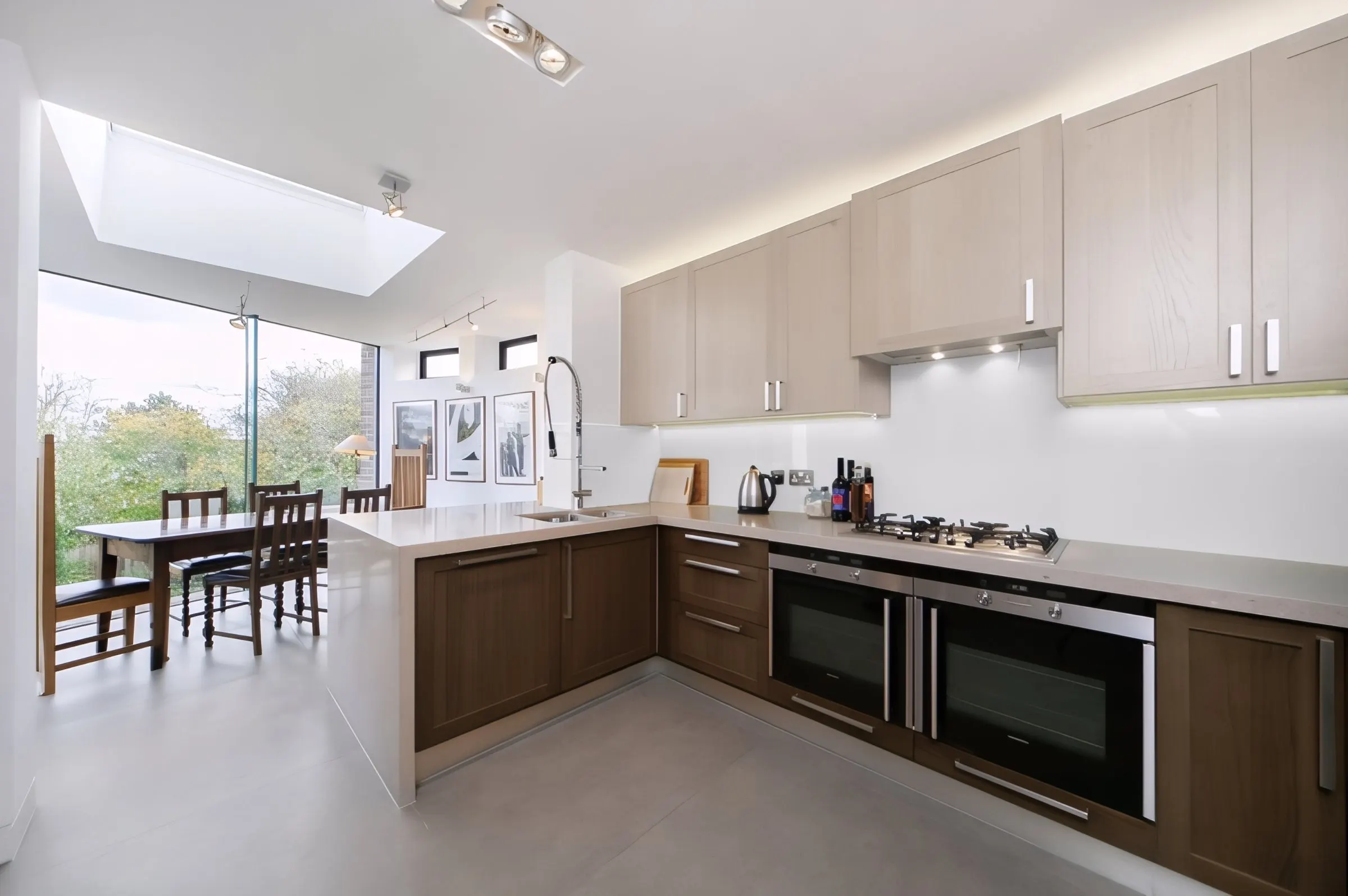 Kitchen with island and rooflight