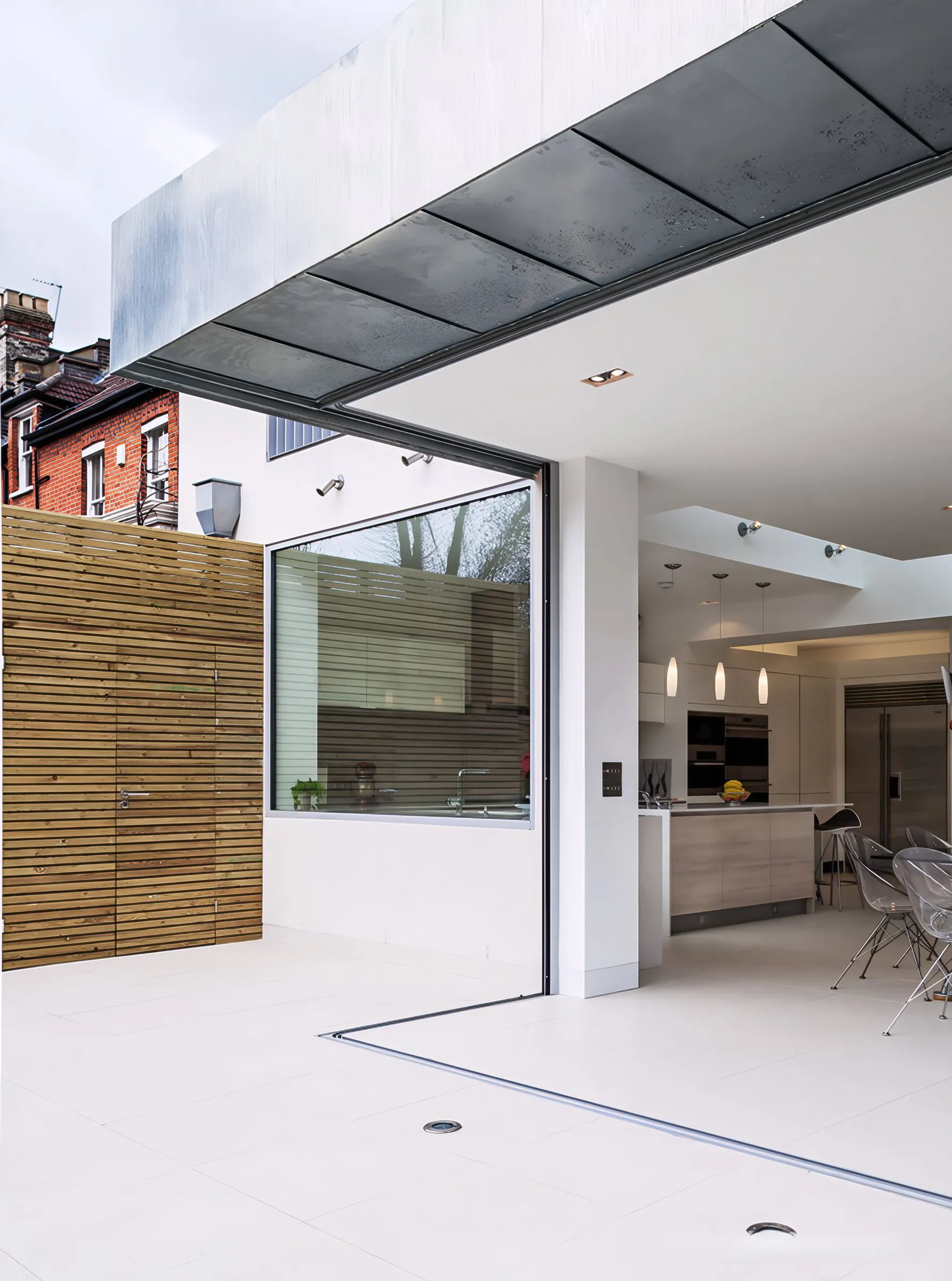 Glazed corner of the extension opening onto the terrace