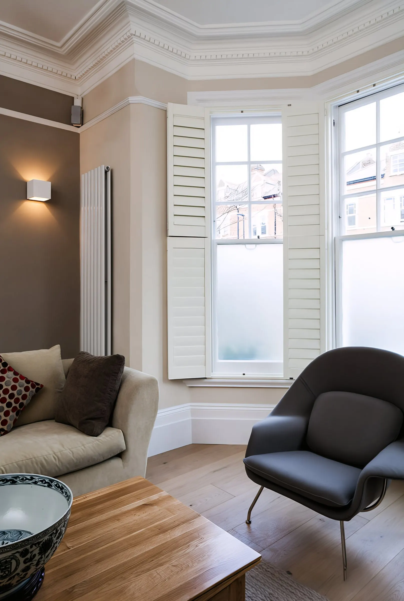 Bay window with timber shutters