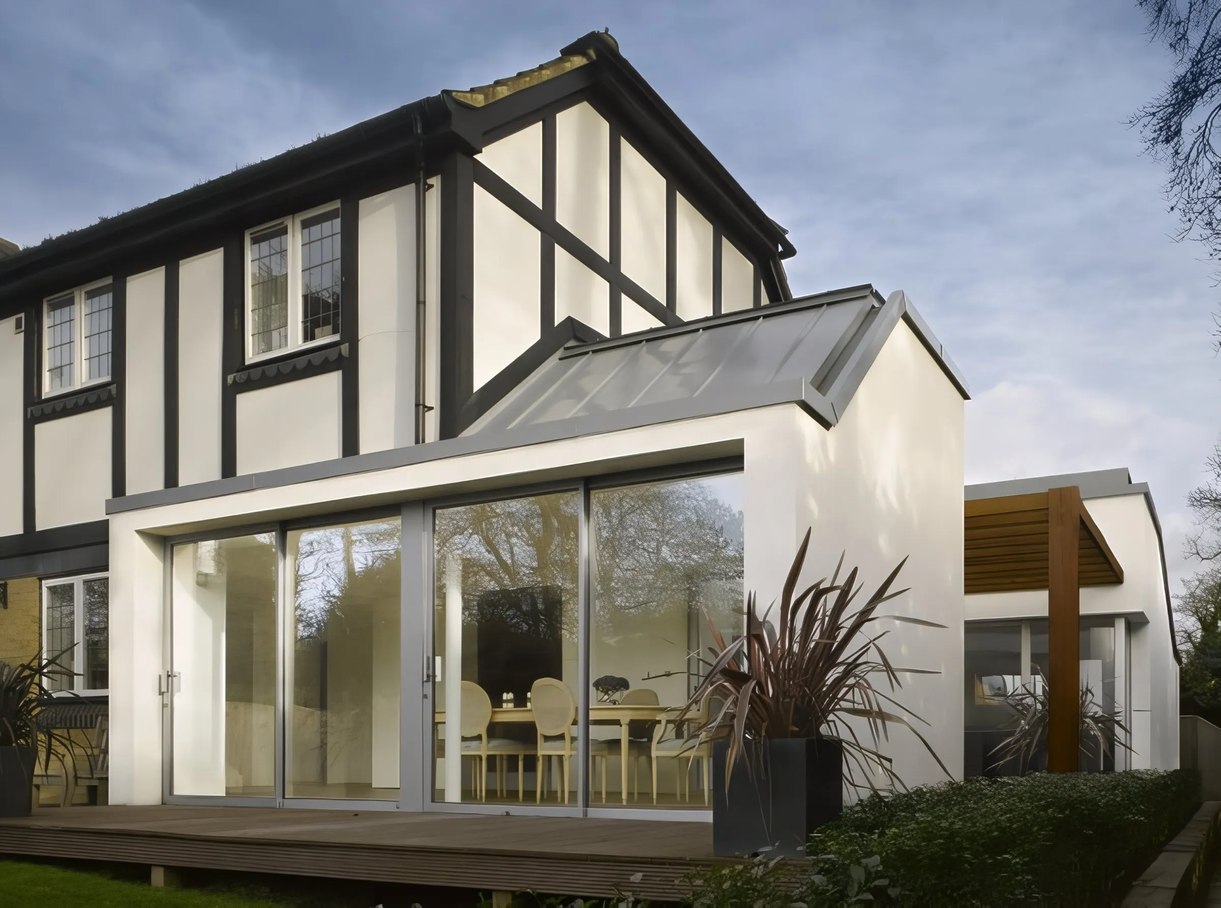 Rear extension with sliding glass doors and timber deck