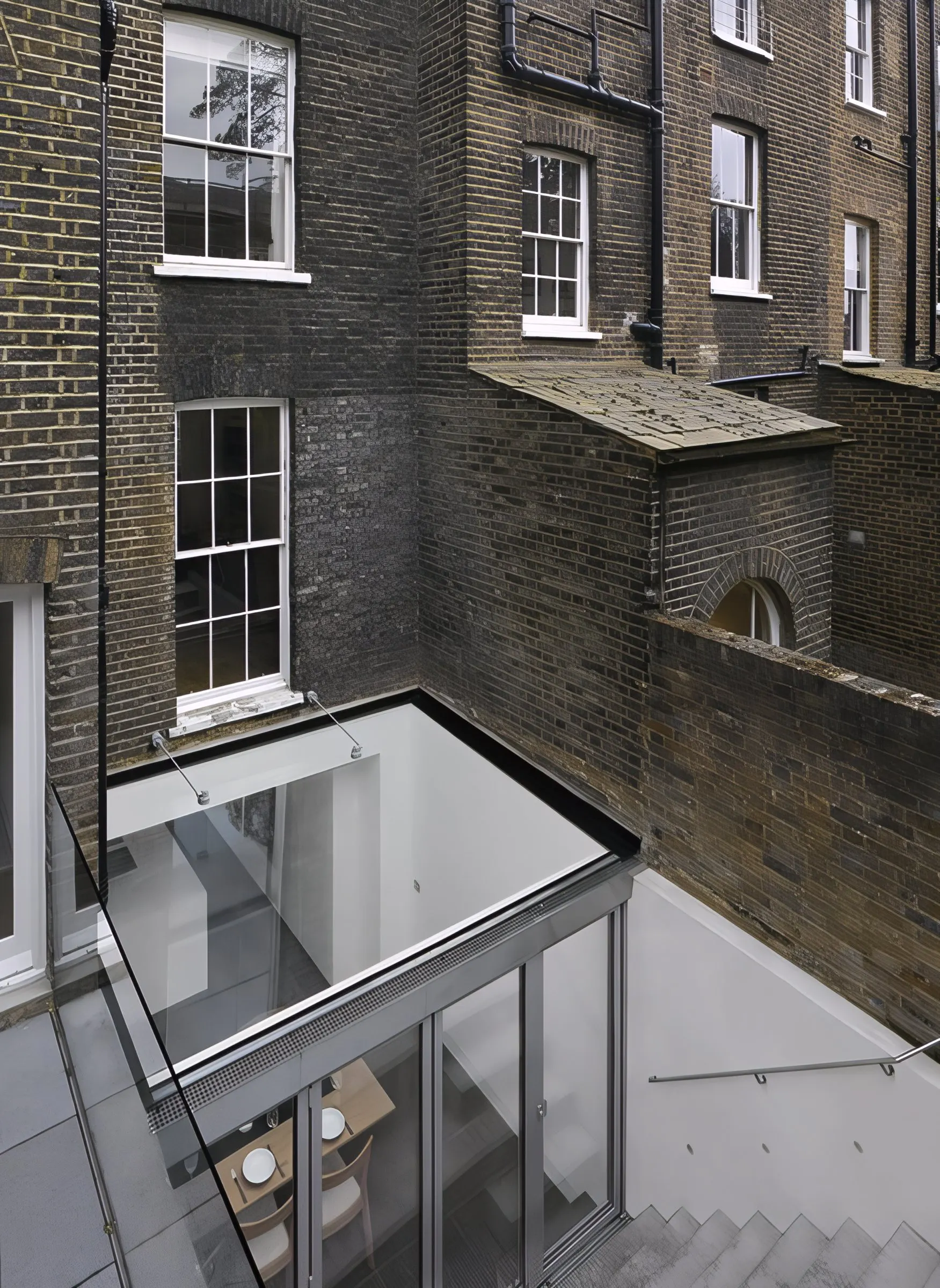 Extension and new concrete steps to the tiered garden