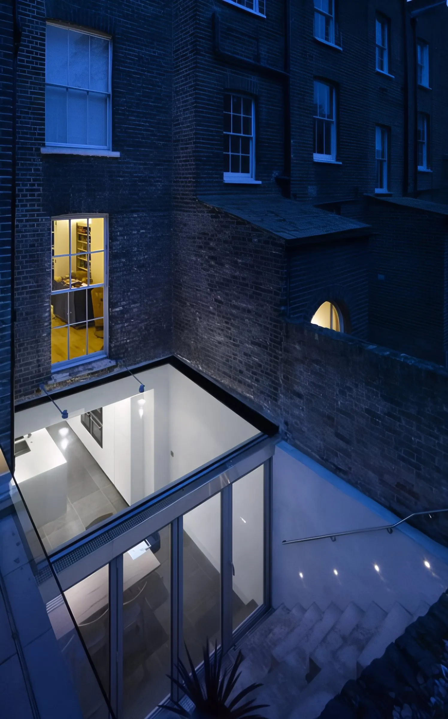 Glazed roof of the extension at night