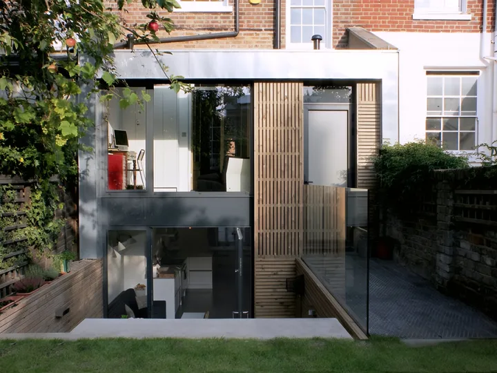 Remodelled rear façade with new glazing and timber panels