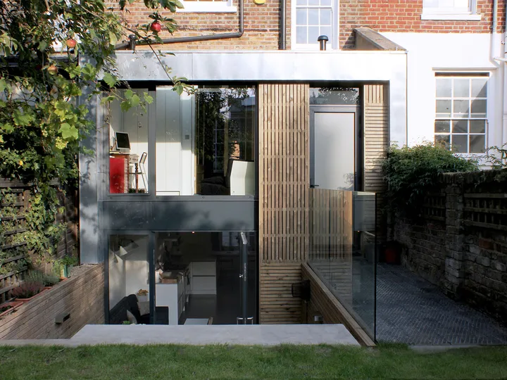 Remodelled rear façade with new glazing and timber panels
